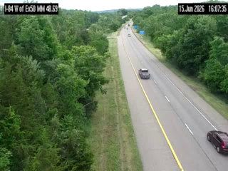 Traffic closest to the camera is traveling eastbound.